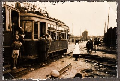 Crowded electric streetcar in Kharkiv and people waiting to board