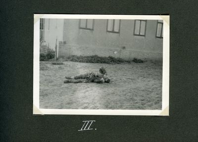 A farmer is dying of starvation near a house in Kharkiv. (Death by starvation series, no. 3)