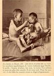 Non-Holodomor: Two young boys at a medical facility in Russia, the older child feeding the younger
