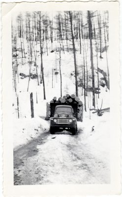 Logging Truck Going Uphill, Circa 1940