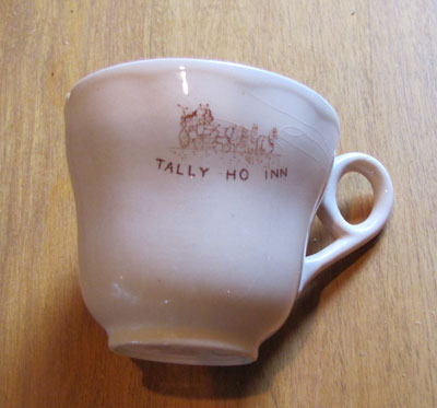 Small China Tea Cup Peach Colored Qith &quot;Tally-Ho-inn&quot; Logo, Circa 1940