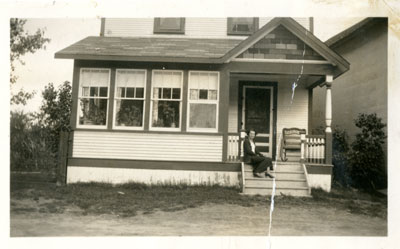 Woman On Porch, Iron Bridge, Circa 1935