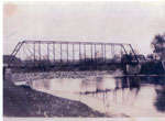 Original Iron  Bridge with Log Jam, Iron Bridge, Circa 1930