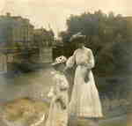 View across Muskoka River at the swing bridge, Huntsville, Ontario. Dr. Howland's General Hospital on left.