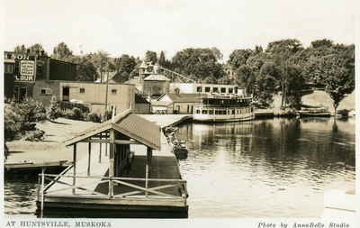 Waterfront Huntsville, Ontario, looking west.  Town dock, the Algonquin, the Huntsville Planing Mills Ltd.