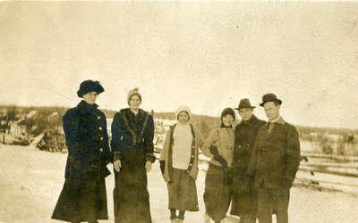 Group portrait on the road to Fairyport, Fairy Lake, Huntsville, Ontario, December 25, 1912.