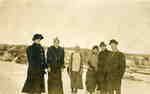 Group portrait on the road to Fairyport, Fairy Lake, Huntsville, Ontario, December 25, 1912.