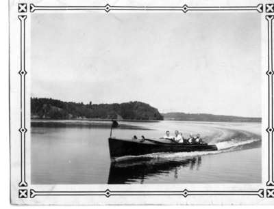 Fairyport Flyer coming into the Fairyport dock, Fairy Lake, Huntsville, Ontario, 1933.