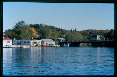 Swing bridge, over the Muskoka River, taken from Hart House, Huntsville,Ontario,1980-1990.