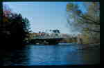 Swing bridge over the Muskoka River, Huntsville, Ontario, looking upstream from below the bridge, 1980-1990.