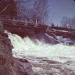Bridge over Marsh's Falls on the Oxtongue River, Lake of Bays, Ontario. Spring 1951.