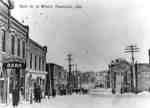 Main Street in Huntsville, Ontario, looking east, in winter, 1907-1920.