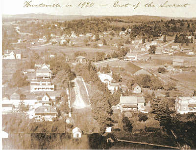 View of Huntsville, Ontario, looking north, taken from Lookout Mountain, c1920. Fairy Avenue in centre.