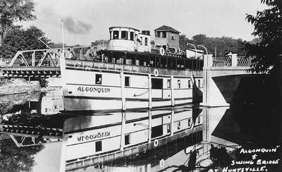 Algonquin steamboat passing through the swing bridge, Huntsville, Ontario.