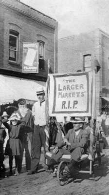 Election wager between H.E. Rice and J.E Mosley, September 1911, Huntsville, Ontario.