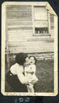 Unidentified Woman Embracing a Young Child