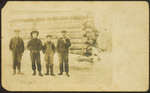 Four Unidentified Men in Front of a Log Cabin