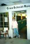 Susan Hoffman standing in doorway of Grace Schmidt Room of Local History