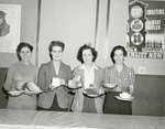 Women serving a meal at Canadian Women's Army Corps' Camp Knollwood, in Kitchener, Ontario