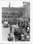 Royal Visit, 1939 - Mary Jane Kennedy presents flowers to Queen Elizabeth at C.N.R. Station, London, Ontario