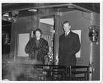 Royal Visit, 1951 - Princess Elizabeth & Prince Philip standing on rear platform of train, London, Ontario