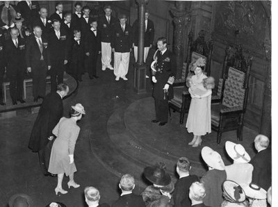 Royal Visit, 1939 - Honourable Mitchell Hepburn, Premier of Ontario and Mrs. Hepburn being presented to the King and Queen in the Ontario Legislature, Toronto, Ontario