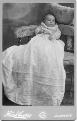 Unidentified child in christening gown, London, Ontario