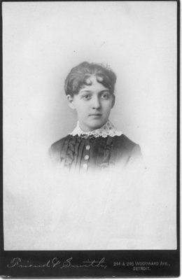 Portrait of an unidentified young woman with white lace collar