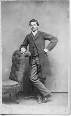 Portrait of an unidentified young man wearing an overcoat, London, Ontario