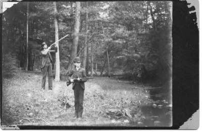 John(?) and Frank Hood, shooting in the woods near London, Ontario