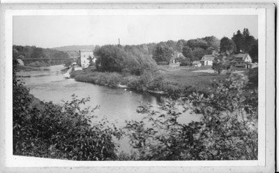 Thames River, looking east toward mill and old steel bridge, Byron, Ontario