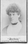 Portrait of an unidentified young woman with curly hair upswept hair, London, Ontario