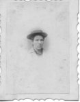Head and neck portrait on an unidentified young woman in a felt boater hat.