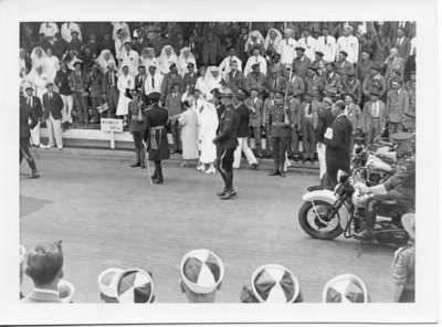 Royal Visit, 1939 - King George VI and Queen Elizabeth get out of car at St. James Street to speak to Westminster Hospital patients, London, Ontario