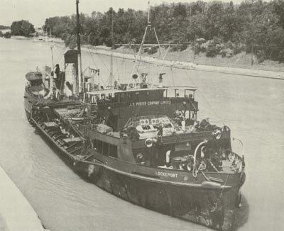 Porter's steam dredge LOCKEPORT upbound into Lock One of the Welland Canal