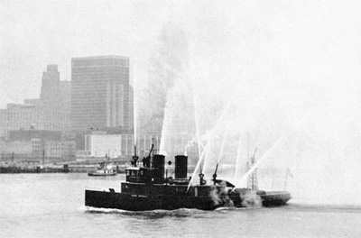 Detroit firetug JOHN KENDALL gives a farewell salute to SOUTH AMERICAN