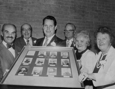 Donation of framed portraits of the past Mayors of Milton to Mayor Gordon Krantz.