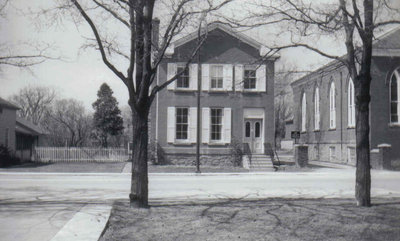 House on Main Street next to St. Paul's United Church.