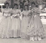 Four young ladies dressed for Centennial Parade, Milton