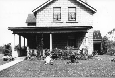 Frederick Stringer in front of the Stringer home on Woodward Avenue (now 351).