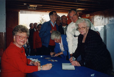 Book Launch - &quot;P.L. Inventor of the Robertson Screw.&quot;  Audrea Lear-Costigan greets past employees of the P. L. Robertson Manufacturing Co. Ltd. at the Milton Fairgrounds.