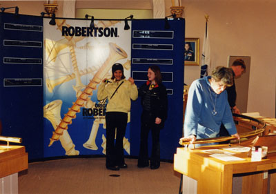 New Year's Levee 1999.  Visitors viewing P. L. Robertson display.