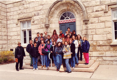 Jim Dills (left) leading a group of students from Thonom-les-Bains, France, on a walking tour of Milton.