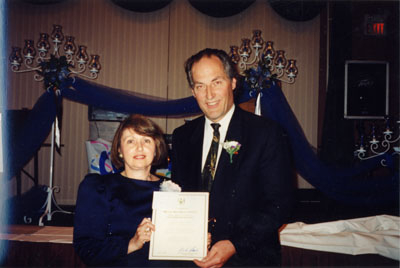 MPP Ted Chudleigh presenting award to Helen Comber, President of the Milton Historical Society