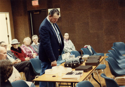 Sherwood Hume speaking to a Milton Historical Society meeting.