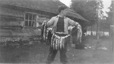 Young man with fish