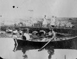 Two women in row boat