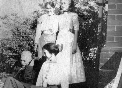 Family group of three women and a man