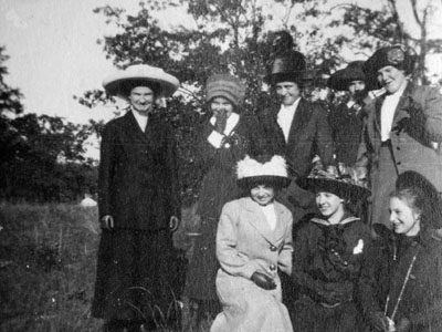 Seven women dressed in autumn clothing