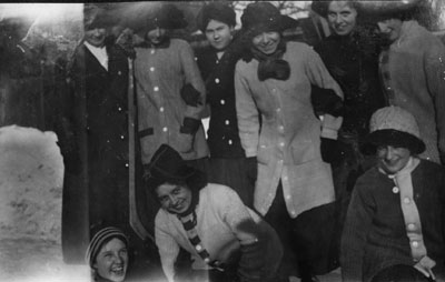 Group of nine women in winter clothng